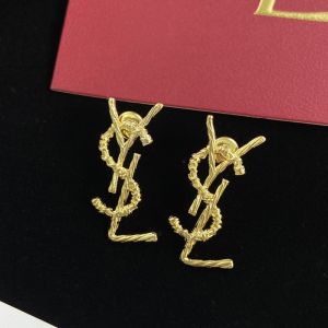 Saint Laurent Opyum Earrings In Rope Metal Gold