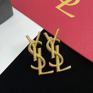 Saint Laurent Opyum Earrings In Snake Metal Gold