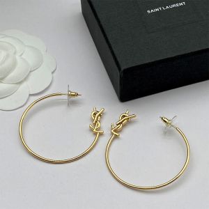 Saint Laurent Opyum Hoop Earrings In Metal Gold