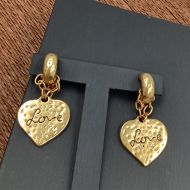 Saint Laurent Love Heart Pendant Earrings In Metal Gold